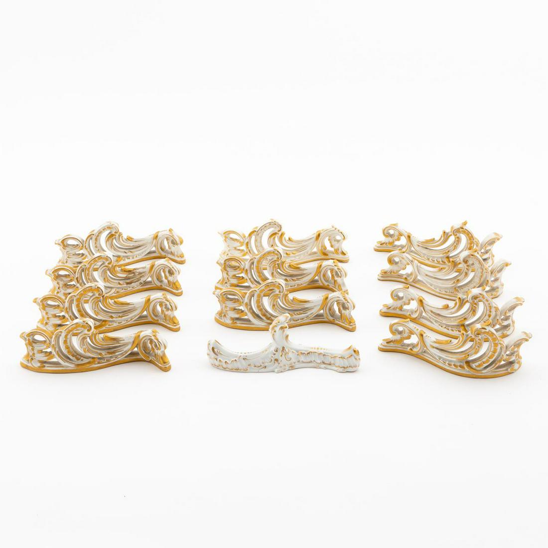 12 KPM ROCOCO STYLE GILT PORCELAIN KNIFE RESTS, C. (1 of 7)