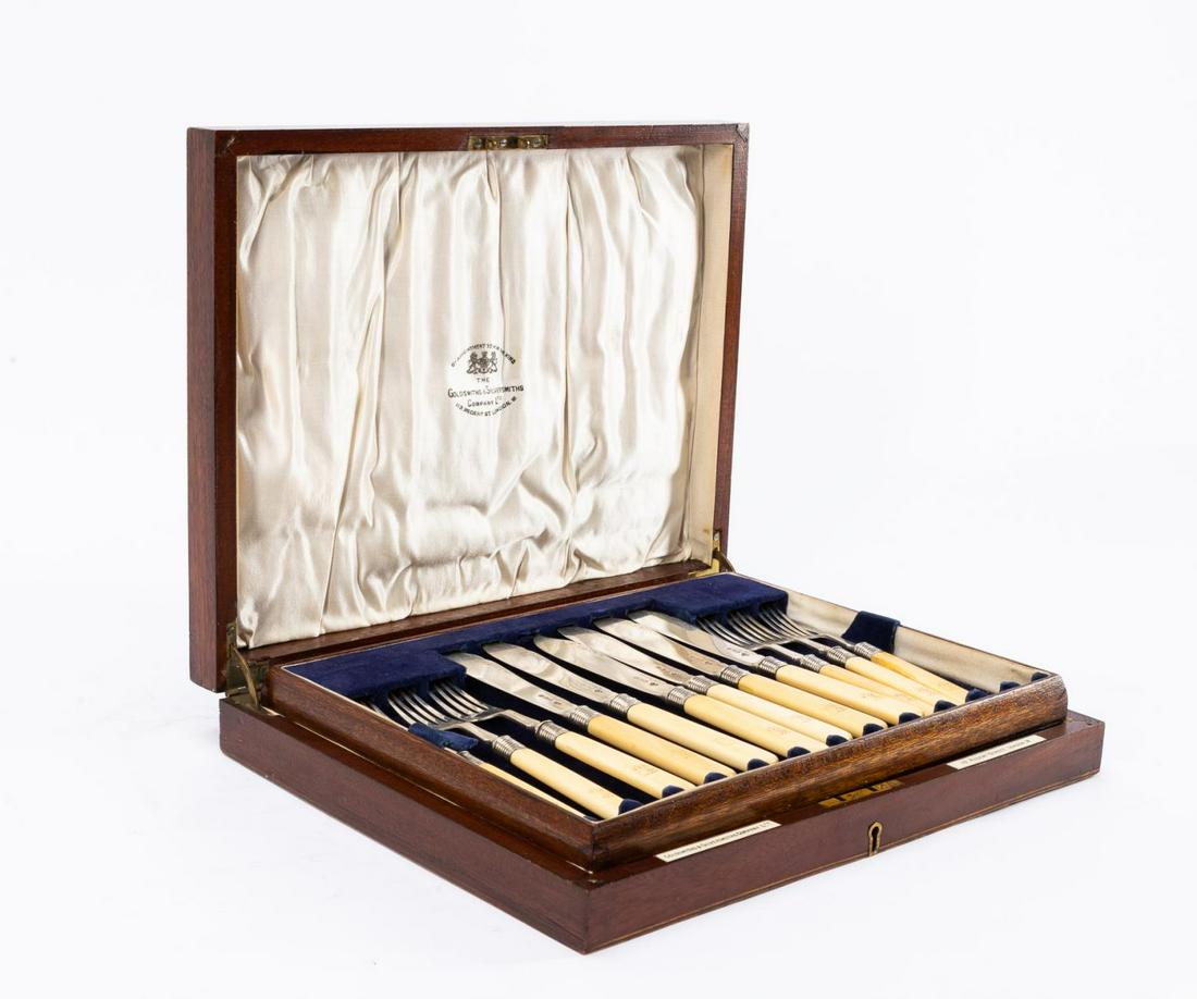 18 PCS, ENGLISH STERLING FISH SET IN CASE: Gibson and Company Limited and Allen and Darwin, British. 18-piece sterling fish set comprising eight forks and eight knives by Gibson and sterling floral with butterfly decorated fish serving set by 