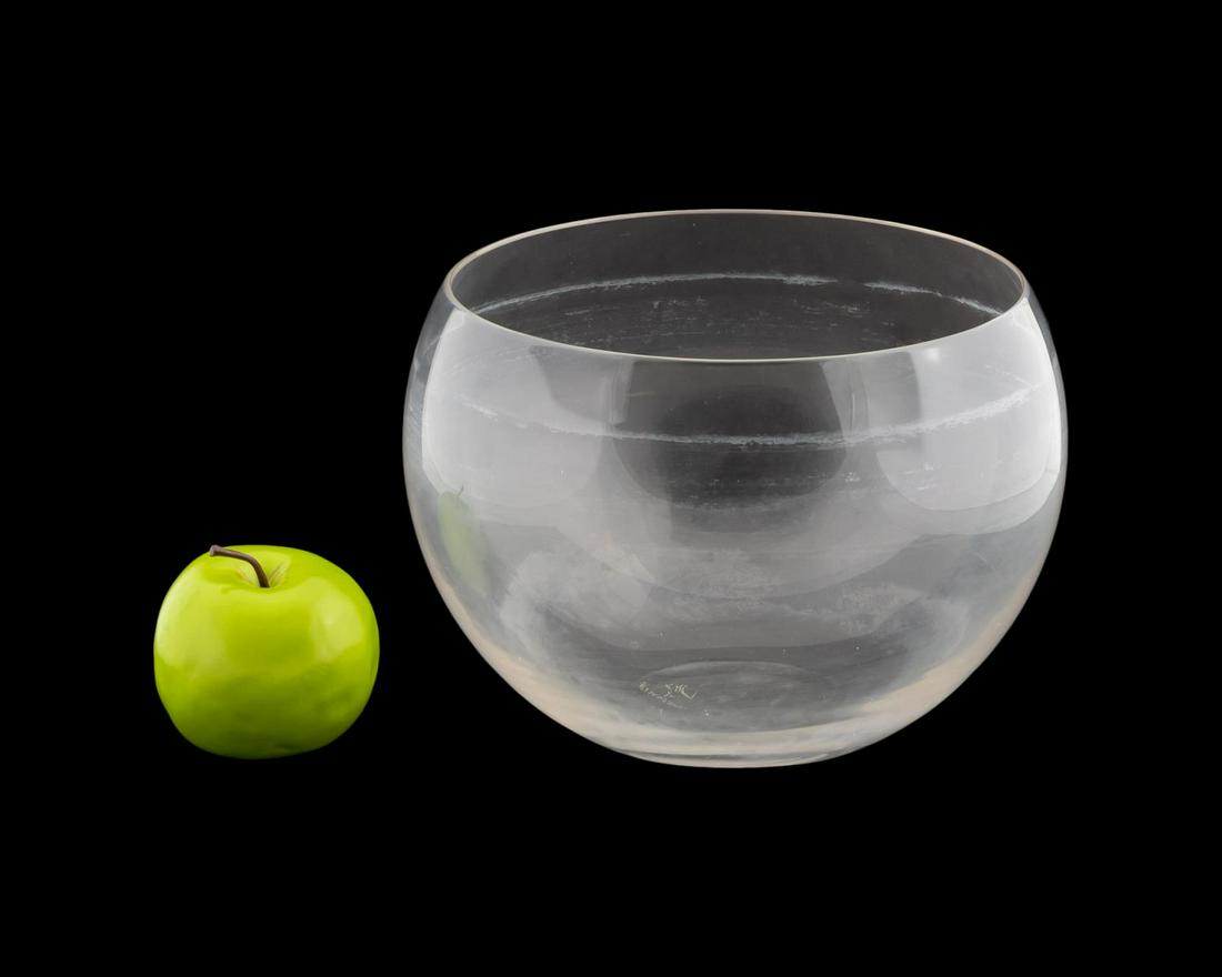 ELSA PERETTI FOR TIFFANY CLASSICAL CRYSTAL BOWL: Elsa Peretti for Tiffany & Co., Contemporary. A blown colorless glass center bowl with polished bottom. Marked "Elsa Peretti for Tiffany" to underside. Approx: h. 7", w. 9.5".