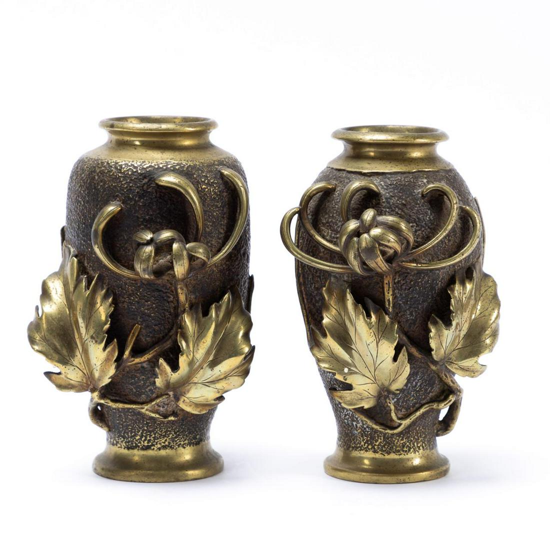 PAIR, JAPANESE BRONZE SPIDER CHRYSANTHEMUM VASES: Japanese. Pair of Meiji type bronze vases, decorated with dimensional spider chrysanthemum flowers. Marked to the underside of foot and with retail label. Provenance: Acquired from the Atlanta Antique