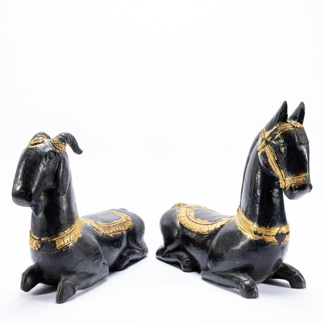 TWO INDIAN CARVED BLACK & GILT RECUMBENT ANIMALS (1 of 5)