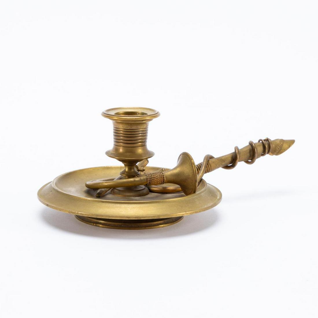 ENGLISH HUNTING THEMED CHAMBERSTICK, BRONZE: British, early 20th century. Gilt bronze equestrian chamberstick with hunting horn and horse hoof handle. Apparently unmarked. Approx. w. 8.25" including handle