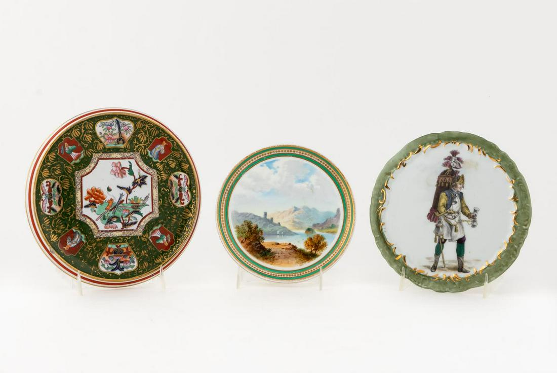 3 PC, PAINTED PORCELAIN TRIVETS, ASHWORTH & OTHERS: English and Continental, 19th and 20th century. Group of three porcelain trivets comprising chinoiserie style Ashworth (7"), hand painted landscape marked "TF" (8.75"), and figural marked "Marchand de
