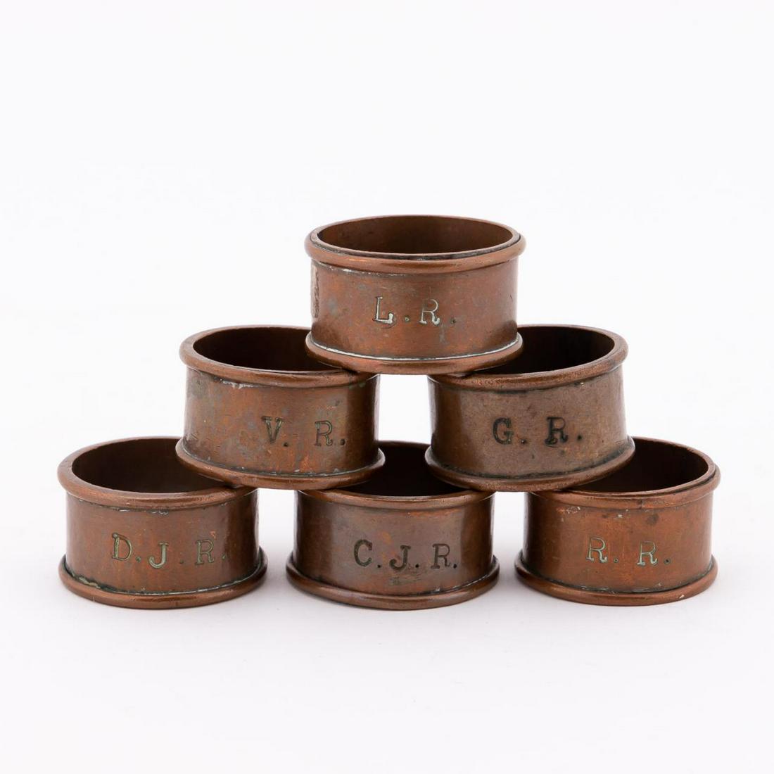 SET OF SIX MONOGRAMMED COPPER NAPKIN RINGS (1 of 5)