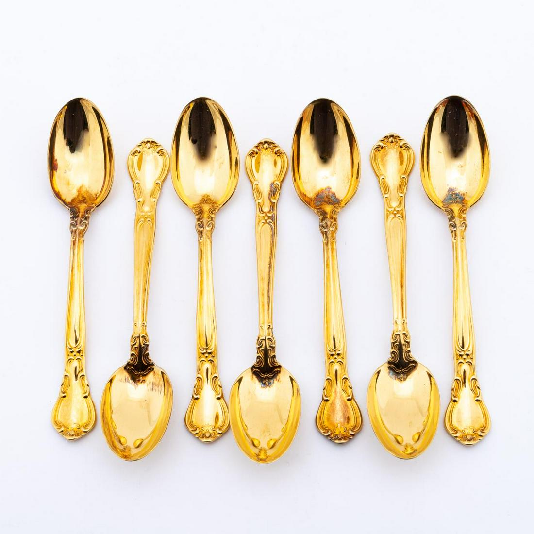 7 PCS GORHAM CHANTILLY GOLD VERMEIL SPOONS: Gorham, 20th century. Seven demitasse spoons in the "Chantilly Gold Vermeil" pattern. Appropriately marked. Approx. w. 4.125", approx. 2.2 ozt