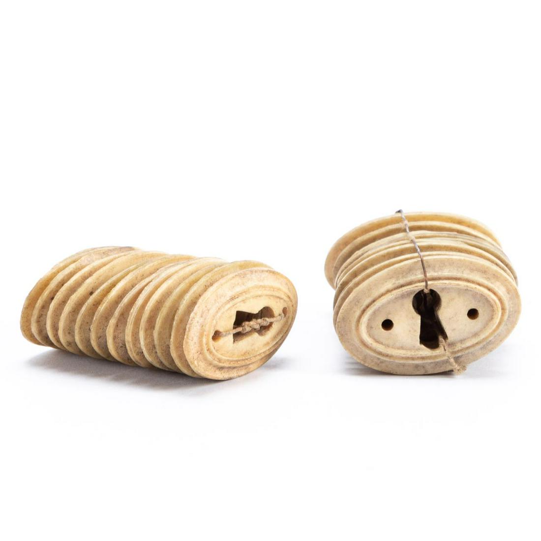 TWENTY-FOUR CARVED BONE ESCUTCHEON KEYHOLE PLATES: American or European, 19th/20th century. Group of twenty-four carved bone escutcheon keyhole plates comprising twelve vertical and twelve horizontal. Unmarked. Approx. of one vertical, h.1.5", w. 1".