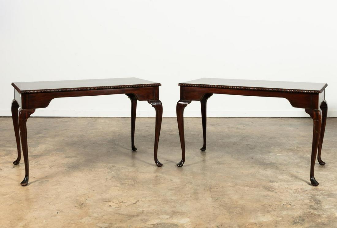 PAIR STICKLEY MAHOGANY QUEEN ANNE CONSOLE TABLES: Stickley (American), late 20th century. Pair of Queen Anne style desks or console tables having decorated edge and pad feet. Marked to underside. Antiquities by Stickley and Stickley International Ltd