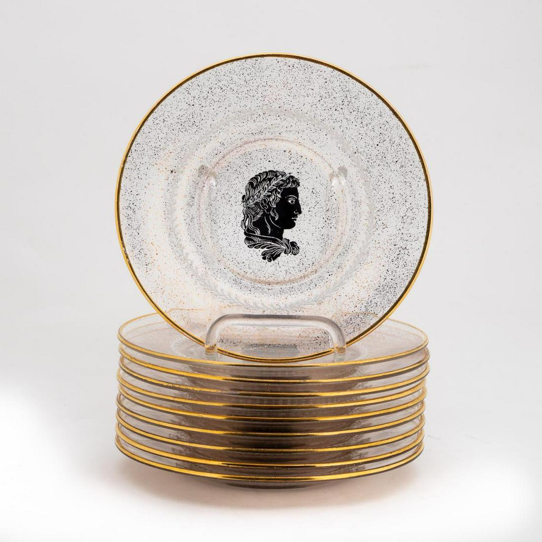 SET OF 10, MCM DESSERT PLATES WITH ROMAN MOTIF: Continental, 20th century. Set of ten mid-century modern neoclassical speckled glass luncheon or salad plates decorated with the head of a Roman. Apparently unmarked. Approx. dia. 8"