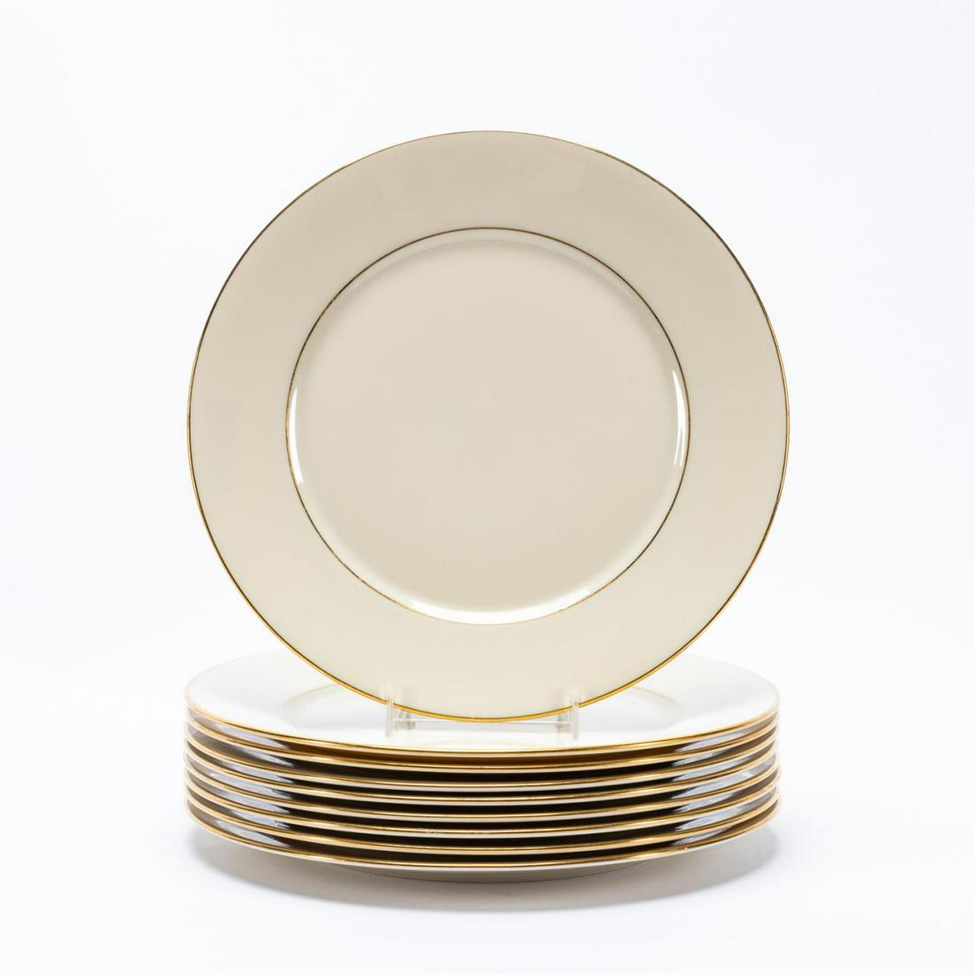 SET 9, LENOX 'HAYWORTH" DINNER PLATES: Lenox (American), late 20th to early 21st century. Set of nine "Hayworth" (active 1982-2010) cream bone china dinner plates with gilt trim. Marked to underside. Approx. of one, dia. 10.75".