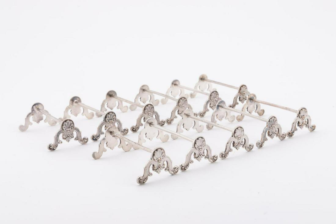SET 11, ROCOCO STYLE SILVERPLATE KNIFE RESTS (1 of 4)