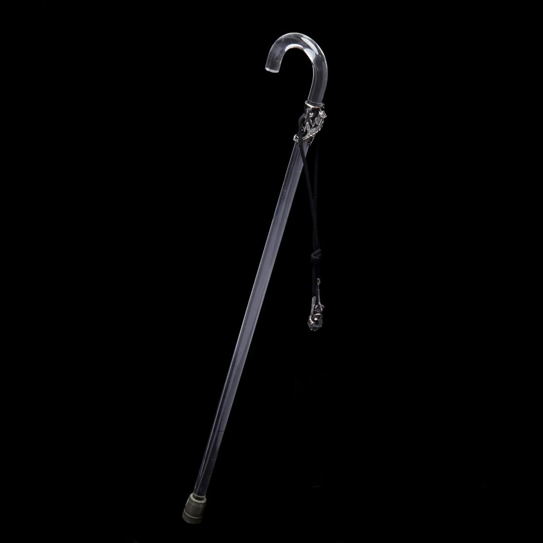 CLIFTON NICHOLSON, STERLING & LUCITE CANE 2006: Clifton Nicholson (American/Indiana, born 1944). Lucite cane with sterling silver dragon and paws holding glass balls. Signed and dated 2006. Approx. h. 32.5"