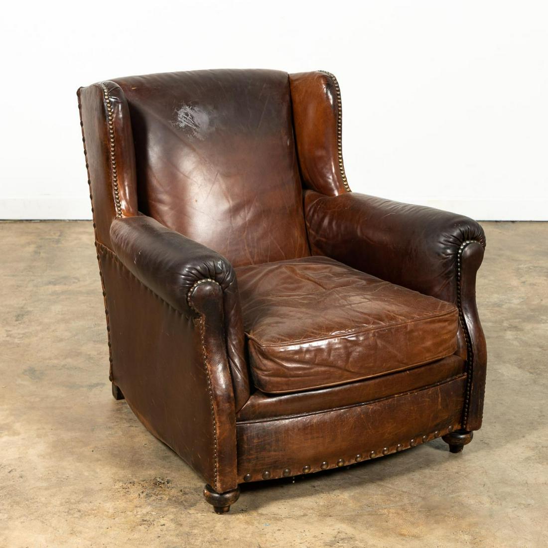 BROWN LEATHER UPHOLSTERED LOUNGE CHAIR (1 of 6)