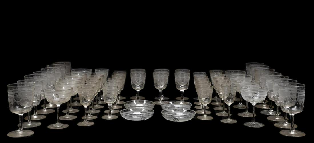 MONOGRAMMED COLORLESS GLASS TABLEWARE, 54PCS: American or European, late 19th to early 20th century. Fifty-four piece group of colorless glass tableware, all with needle etched decoration and monogrammed "K", comprising: fourteen goblets (5.75"),