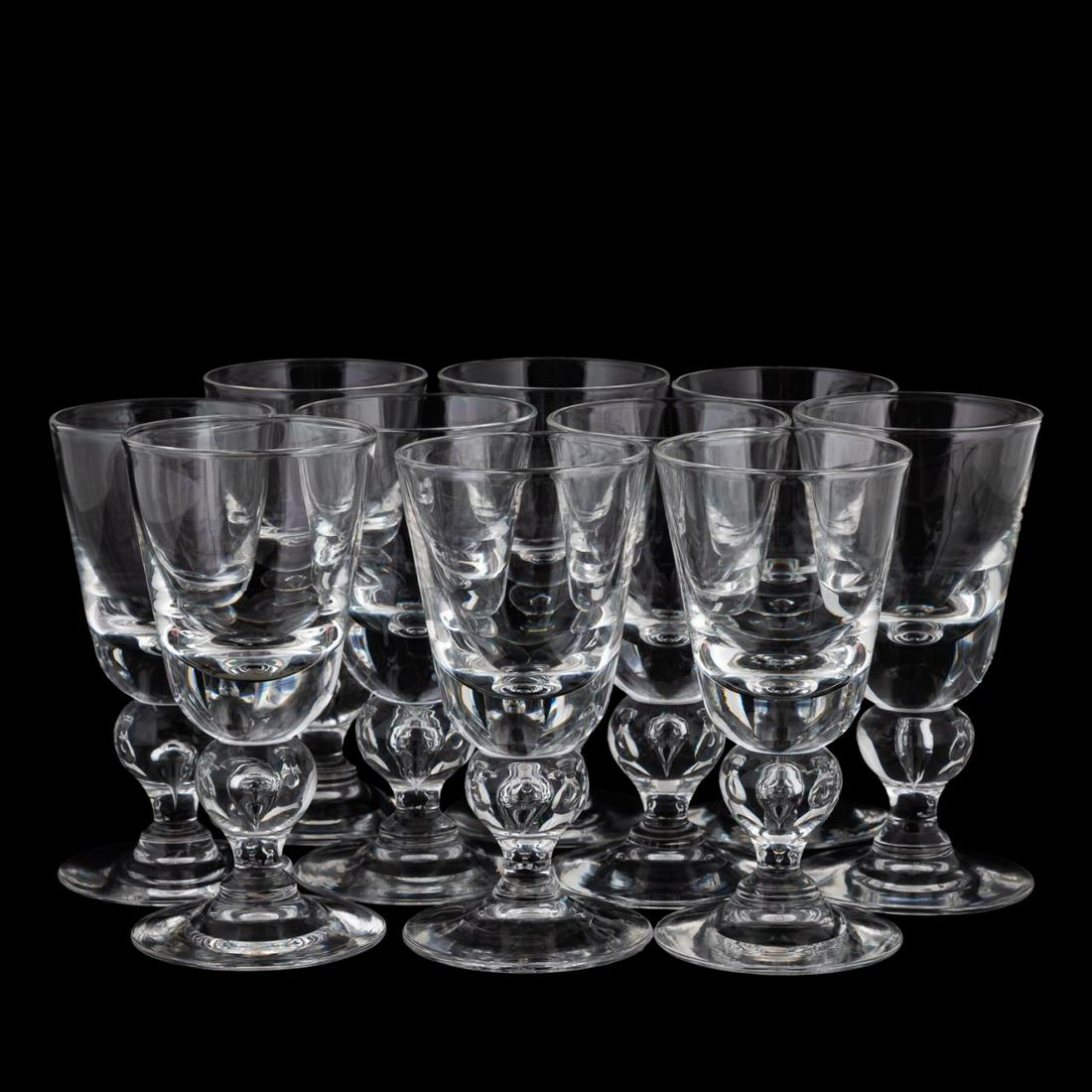 10 PCS, STEUBEN CRYSTAL WINE GLASSES IN TEARDROP: Steuben, contemporary. Ten pieces of baluster form crystal wine glasses. Appropriately marked. Originally designed by George Thompson in 1940. Approx. h. 5.75"