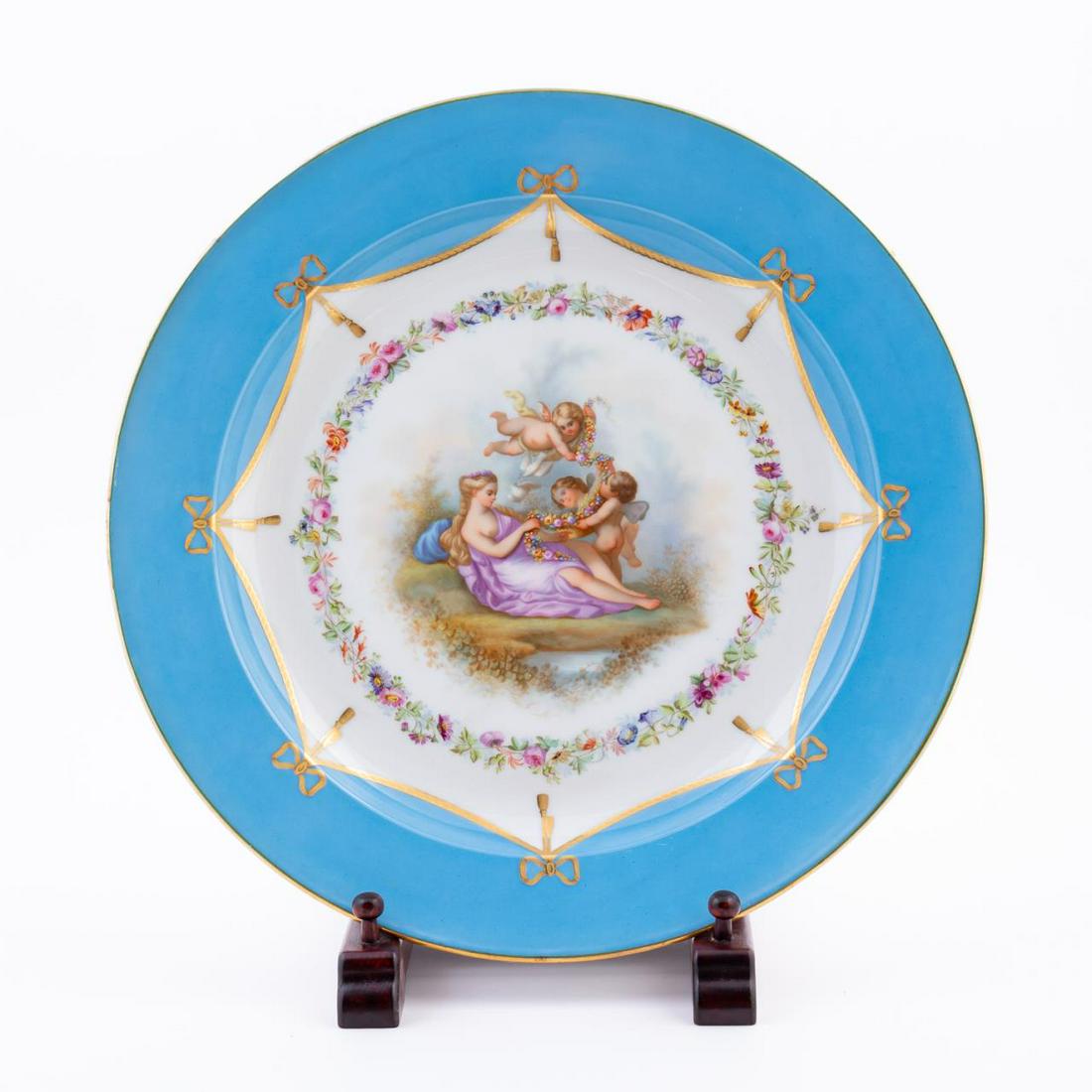 LARGE BLUE, GILT BOW, & PUTTI PORCELAIN CHARGER (1 of 6)