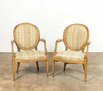 PAIR, GEORGE III-STYLE PAINTED WOODEN ARMCHAIRS: English, 20th century. Pair of Adams and George III-style oval-back painted wooden armchairs with fluted legs. Unmarked. Catalog Note: These chairs decorated Nell Woodruff's bedroom at the Windcrofte