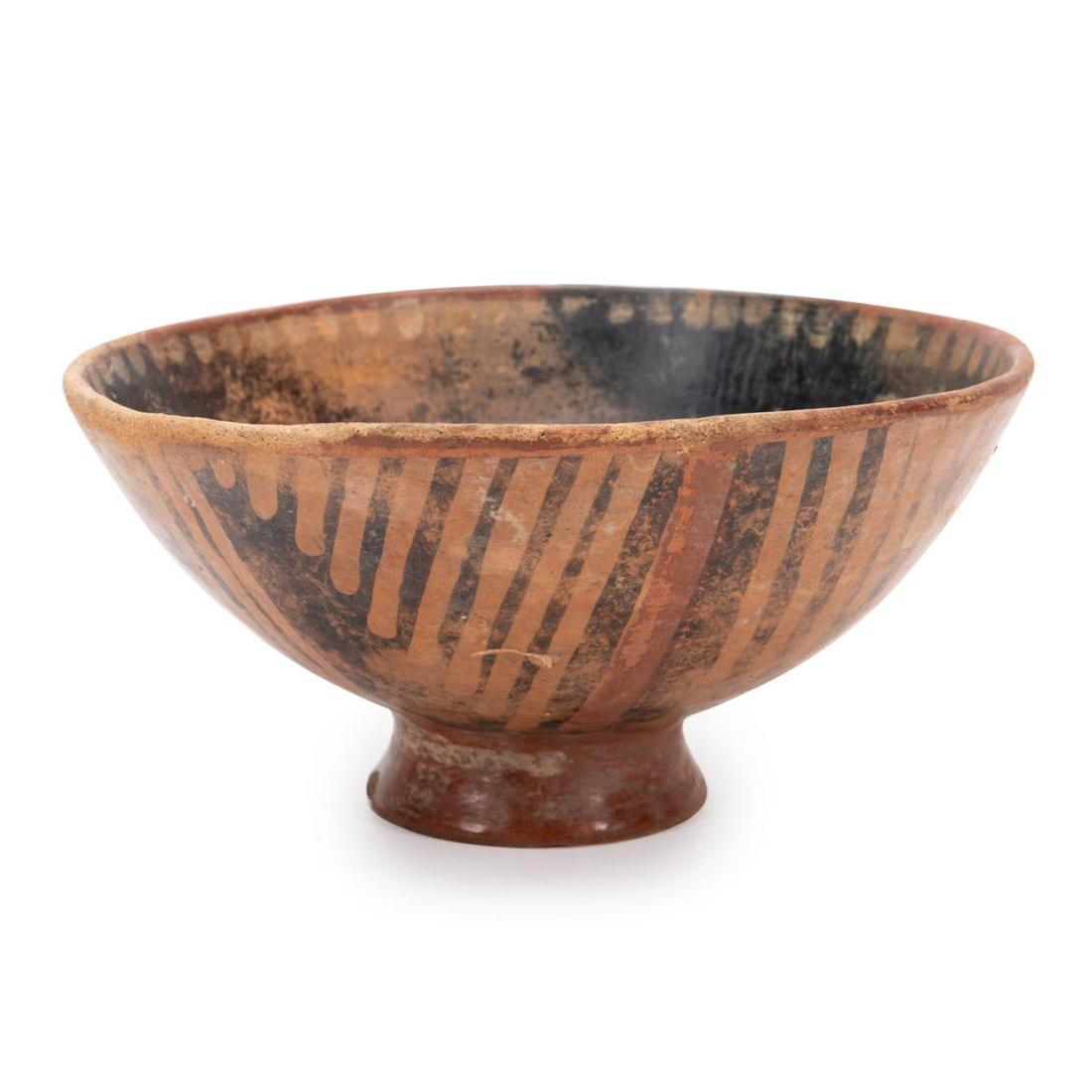 PRE-COLUMBIAN STYLE REDWARE BOWL: Pre-Columbian style redware bowl, of tapering form on a raised foot, with black decoration to the interior and geometric black decoration to the exterior. Provenance: From the Private Collection of Ru