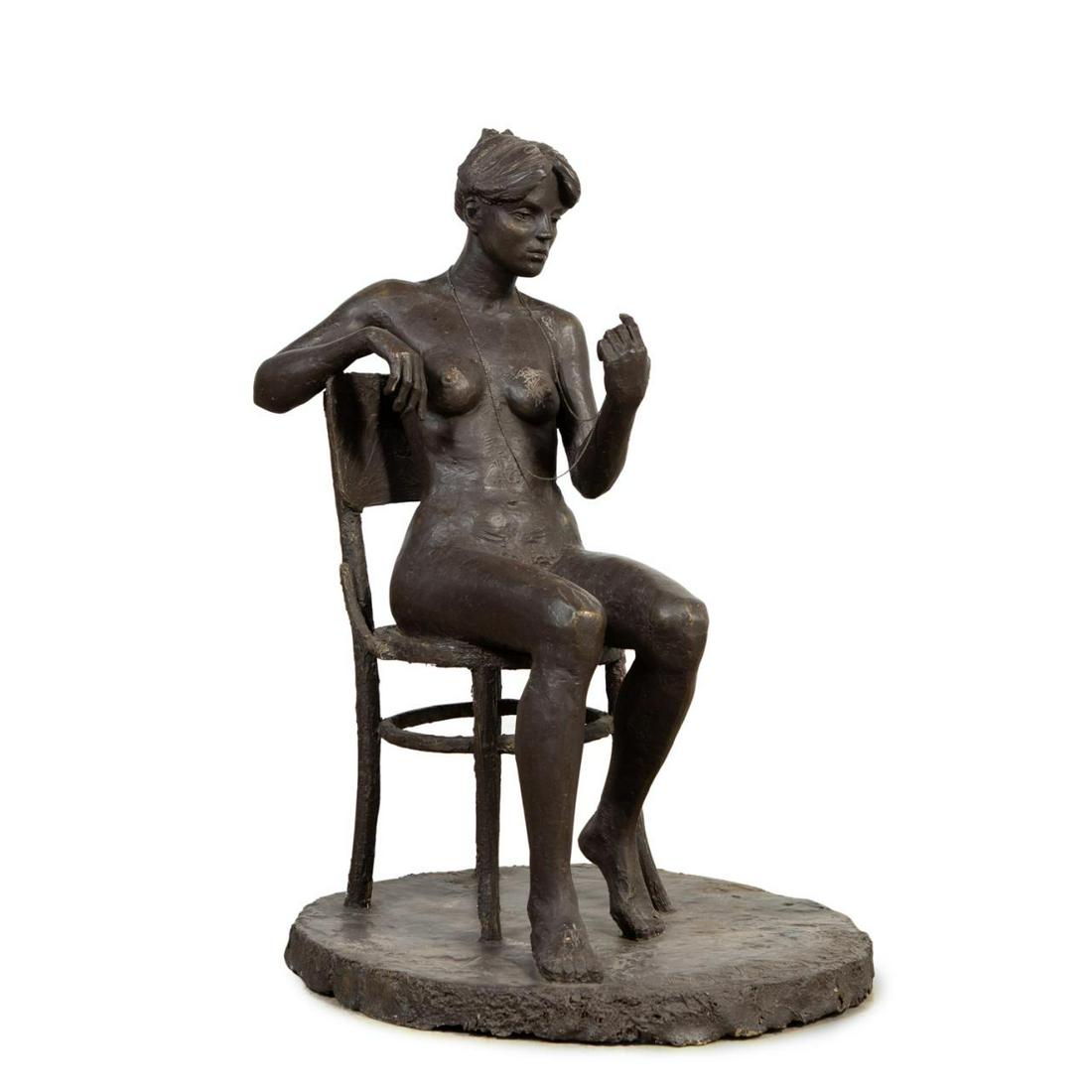 BANVOLGY, LIFE SIZE BRONZE TONE FIGURAL NUDE: Laszlo Banvolgy, (Hungarian b. 1962), 'The Locket," life size bronze tone painted plaster sculpture of a seated nude, 1986, depicting a nude woman resting in a bentwood chair as she contemplates the p