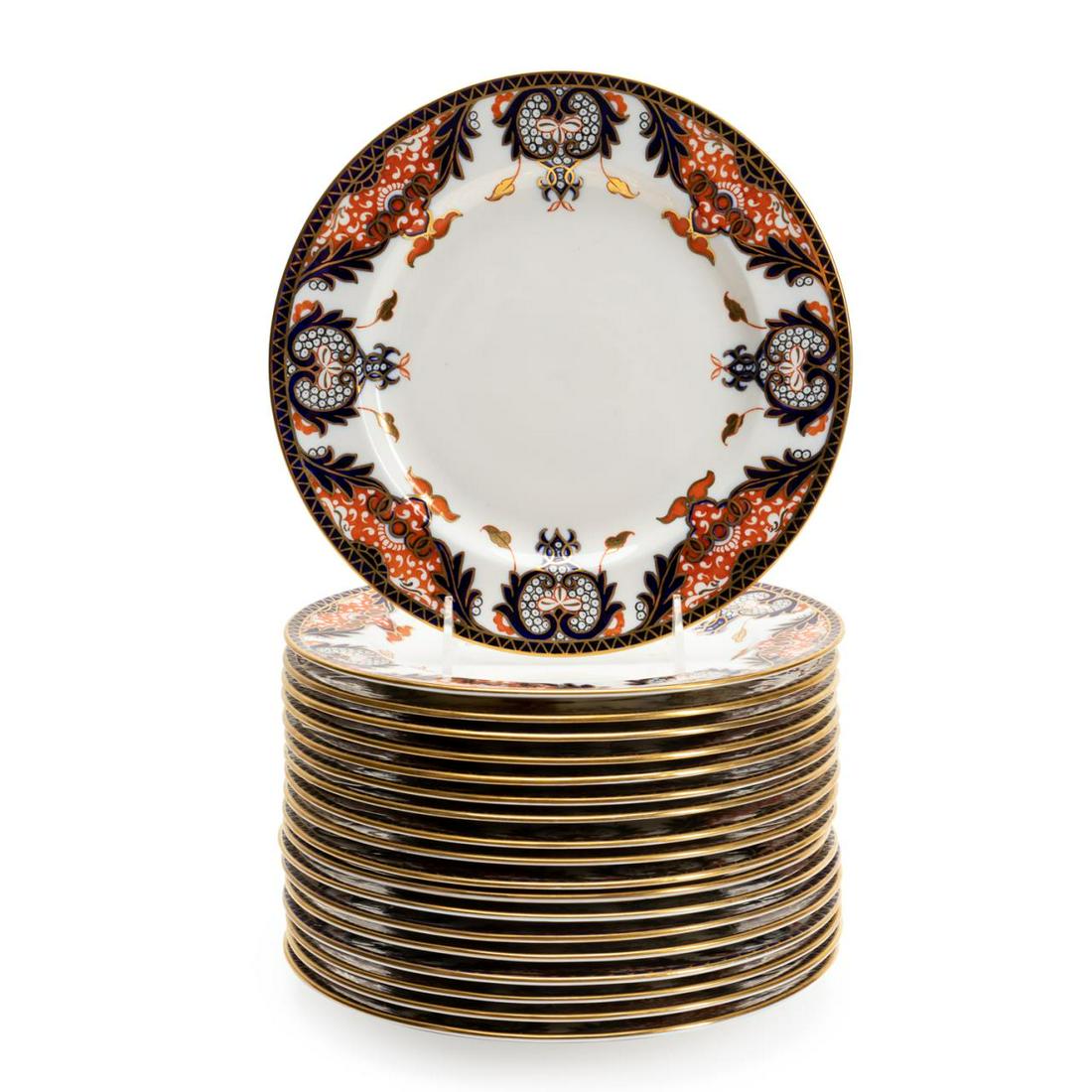 ROYAL CROWN DERBY IMARI LUNCHEON PLATES, 19PC: Royal Crown Derby, date marks 1910, 1937, 1938, 1951, and 1954, set of nineteen Imari palette bone china luncheon plates, all appropriately marked with seven having retail backstamps for William H. Pu