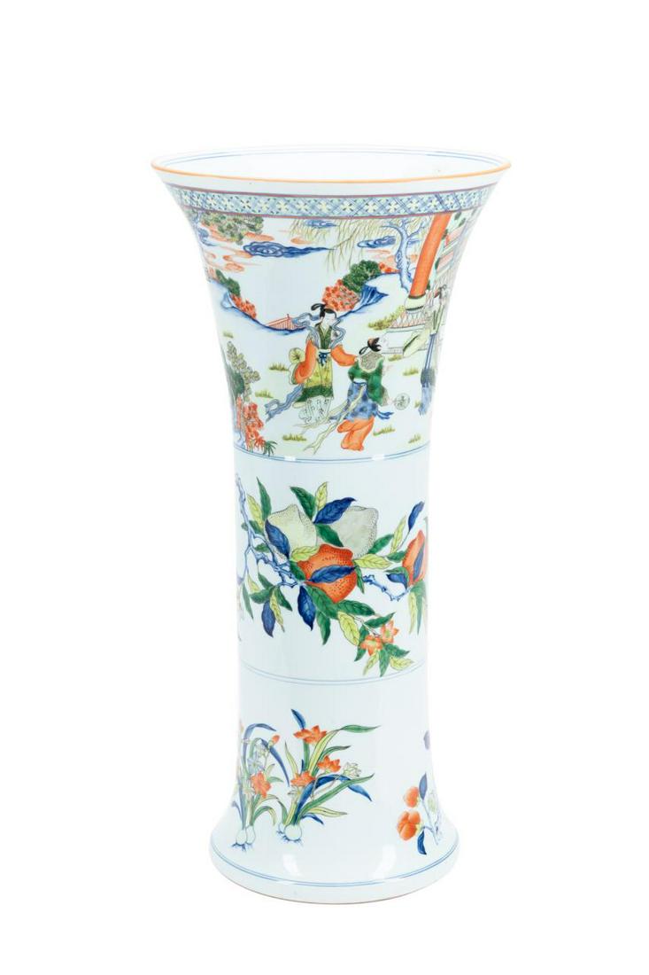 TALL CHINESE WUCAI GU BEAKER: Tall Chinese Wucai Gu beaker, having a trumpet neck decorated with a scene of courtiers enjoying leisure pursuits, above a band of peaches and prunus blossoms, and a band of narcissi and dogwood, the 