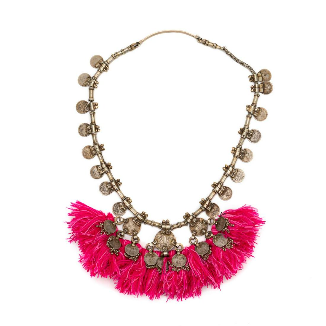AFGHAN SILVERED METAL COIN AND TASSEL NECKLACE: Afghan silvered metal coin and tassel necklace, having Indian 25 Paisa coins interspaced with tube beads and terminating to three 1 Rupee coins issuing pink yarn tassels, 25 Paisa coins, and balls. Pr
