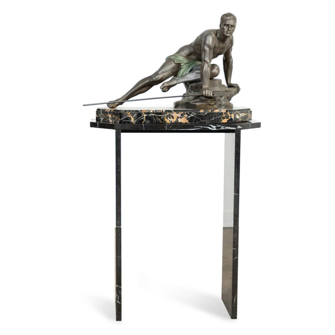JEAN DE RONCOURT FIGURE OF A HUNTER ON MARBLE BASE: Jean de Roncourt (French 19th/20th century), undated and untitled, Art Deco patinated white metal sculpture of a hunter, circa 1930, resting on a Nero Portoro marble plinth, with black marble pedestal
