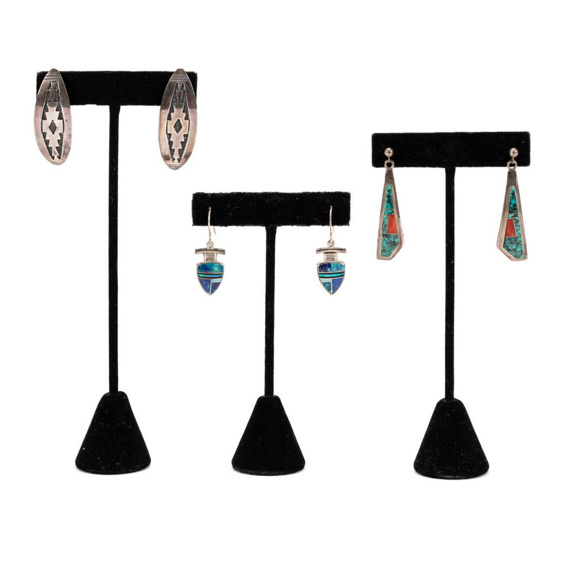 THREE PAIRS STERLING & STONE INLAY EARRINGS: Three pairs of Native American sterling and stone inlay earrings, comprising a pair of Sheila Tso lapis and opal inlay earrings, a pair of Robert Johnson shell and turquoise earrings, and a pair of na