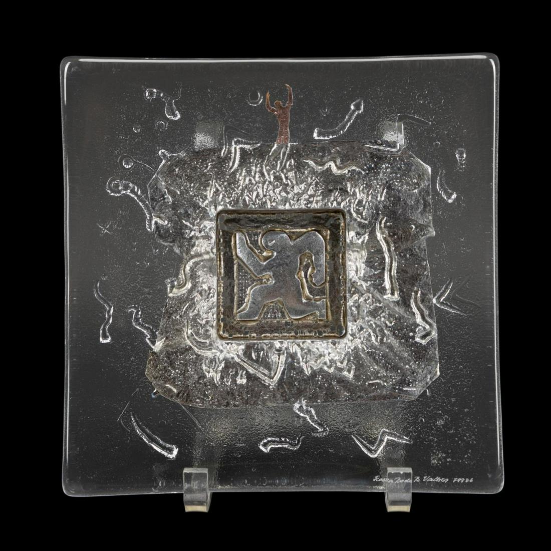 B. VALLIEN FOR KOSTA BODA DOMINO GLASS DISH: Bertil Vallien (Swedish) for Kosta boda, "Running Man" from the Domino series, circa 1994, the square footed glass dish with silver and copper overlay, having an impressed running figure and abstract
