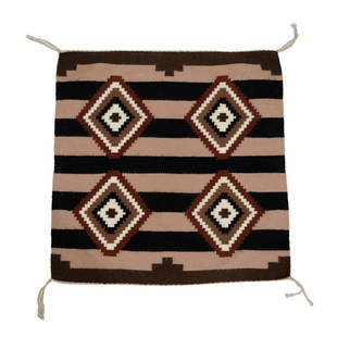 SMALL HANDWOVEN WOOL NAVAJO MAT: Native American handwoven wool Third Phase Chief's blanket style mat, featuring a classic third phase design with serrated or hooked diamonds in rust, cream, tan, black, and olive on a black and tan s