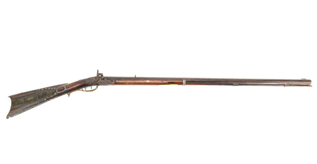 INDIAN TRADE KENTUCKY LONG RIFLE, CA. 1800: American antique percussion Indian Trade Kentucky long rifle,18th/19th century, having an octagonal barrel, tiger maple half stock, double set triggers, brass furniture, coin silver accents or inlay,