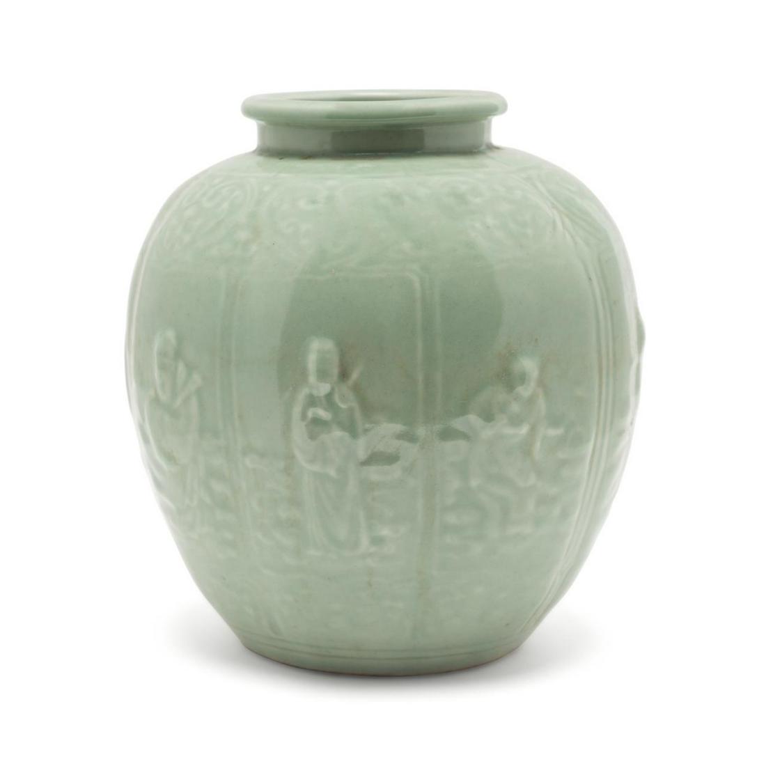 CHINESE CELADON EIGHT IMMORTAL PANEL VASE: Chinese Celadon immortal vase, of void form with a short neck, the body decorated with a relief ruyi band above eight high relief panels containing images of the Eight Immortals, the underside having