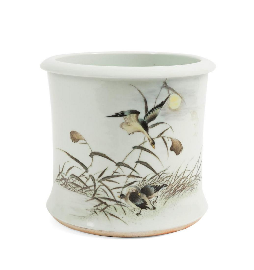 CHINESE ENAMELED PORCELAIN BRUSH POT W/ DUCKS: Chinese enameled porcelain brush pot, of cylinder form with flattened rim, the body depicting a scene of ducks in marsh grasses at night with a text and seals en verso, having no apparent marks. Appro