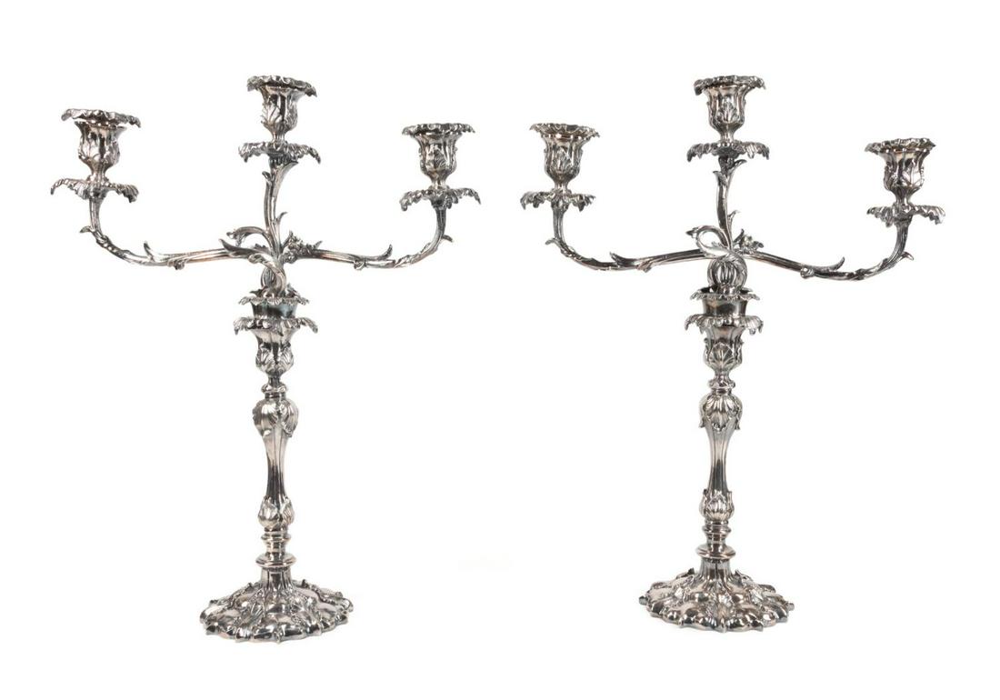 PAIR ELKINGTON & CO. THREE-LIGHT CANDELABRA, 1866: Pair of Elkington & Co. (English 1824-1963, three-light silverplate convertible candelabra in the Rococo taste, 1866, each having a foliate patterned stem issuing curving arms with nozzles and drip pa