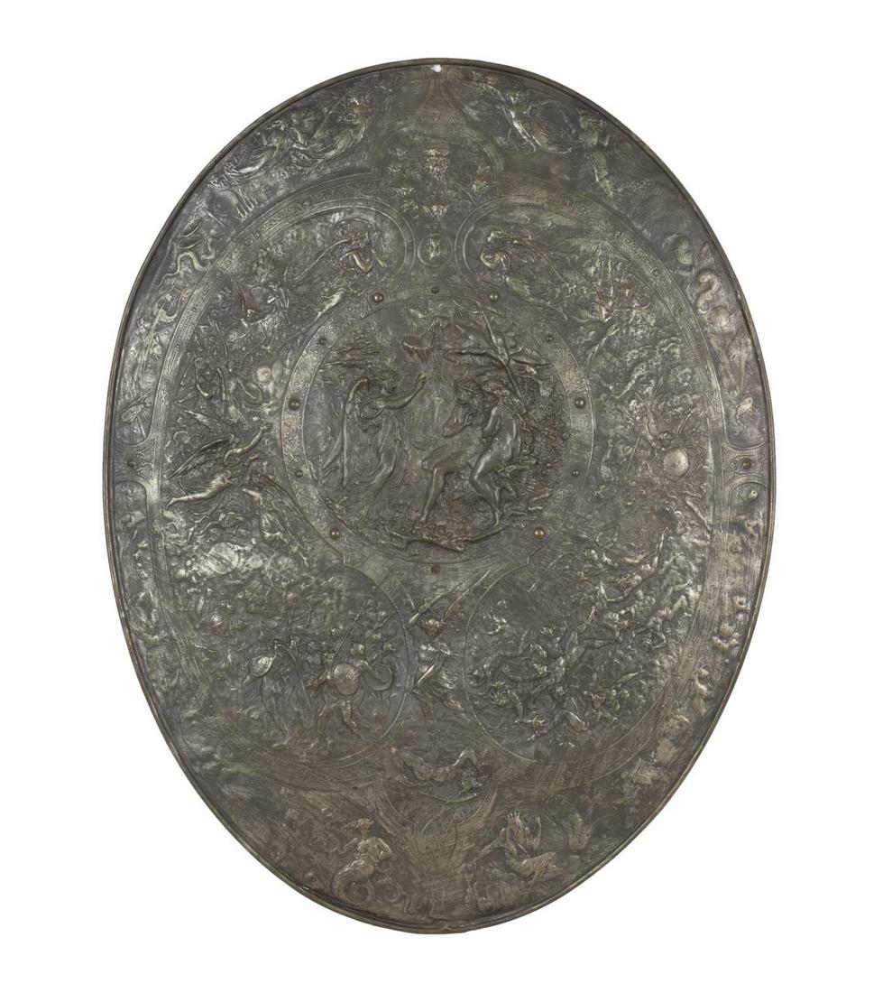 MANNER OF ELKINGTON & CO. , "THE MILTON SHIELD": Manner of Elkington, & Co. (English 1824-1963), silverplated "The Milton Shield", 19th century, after a design by Leonard Morel-Ladeuil (French 1820-1888), depicting the expulsion of Adam and Eve, app