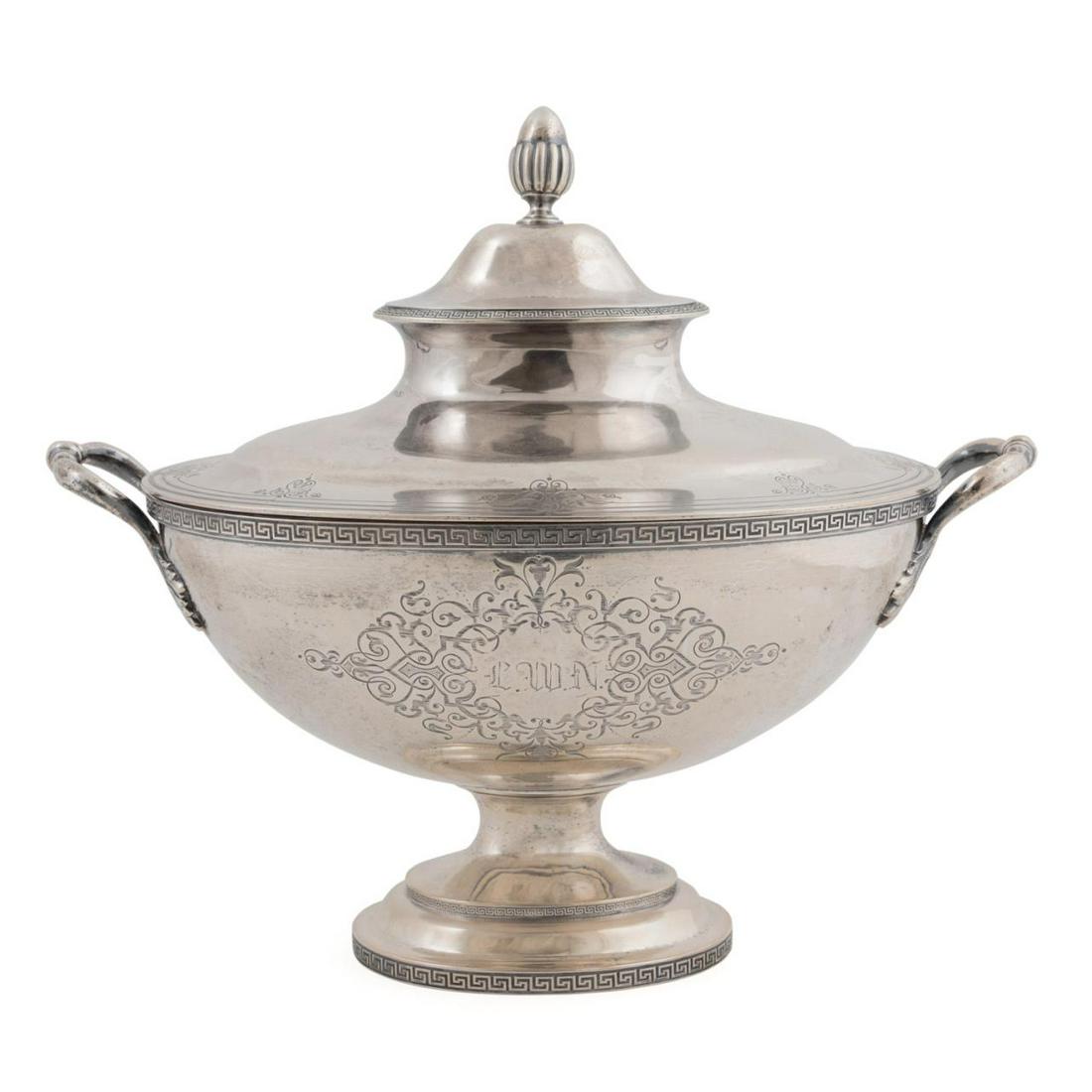 EOFF & SHEPARD COIN SILVER LIDDED TUREEN, 1850S: Eoff & Shepard coin silver lidded tureen in the Neo-classical taste, circa 1850, having an acorn finial above a lid with Greek key and and engraved foliate bands, resting on an oval bowl with a Greek 