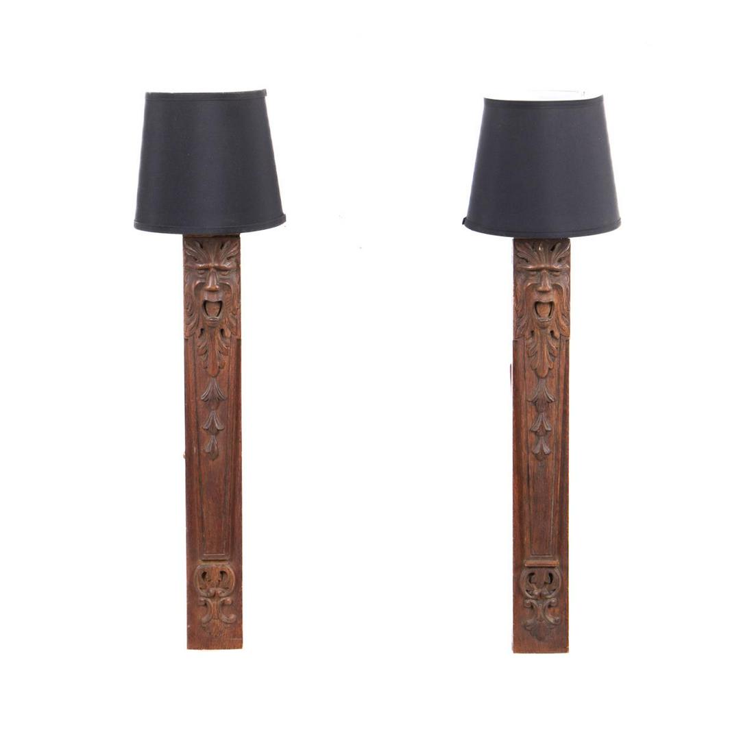 PAIR RENAISSANCE REVIVAL GREEN MAN WALL LIGHTS: Pair of American or European Victorian carved oak Renaissance Revival Green Man panels, 19th century with later elements, having previously been fitted in a piece of furniture and now repurposed as a 