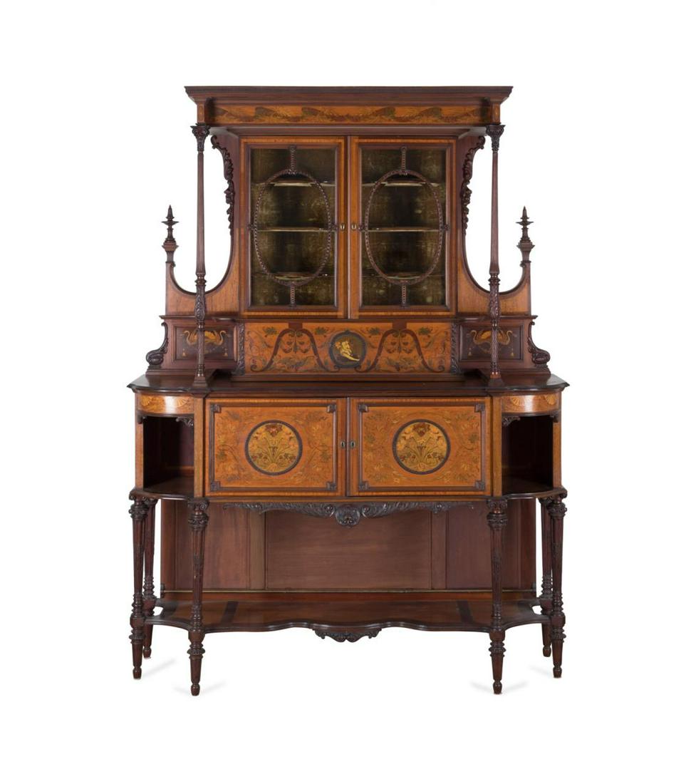 EDWARDIAN STYLE CARVED WOOD & INLAID BUFFET: Edwardian style carved and mixed wood inlay buffet or china cabinet, late 19th or early 20th century, having a shaped cornice, inlaid foliate frieze, carved "C" curves terminating in turned finials, a