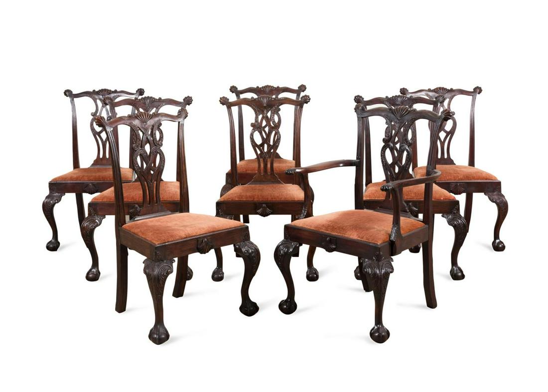 SET OF 8 CHIPPENDALE STYLE MAHOGANY DINING CHAIRS: Set of eight English mahogany dining chairs in the George III Chippendale taste, 19th/20th century, comprising one arm and seven side chairs, each having a serpentine shell carved crest with scrolled