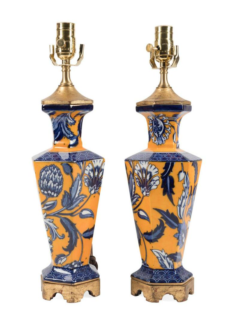 PAIR 19TH C. ENGLISH FLORAL VASES MOUNTED AS LAMPS: Pair of Thomas Forester Ltd. (English 1877-1883), Phoenix Ware "Valencia" earthenware hexagonal form vases now mounted as lamps, late 19th century, each having orange and blue floral transfer decorati