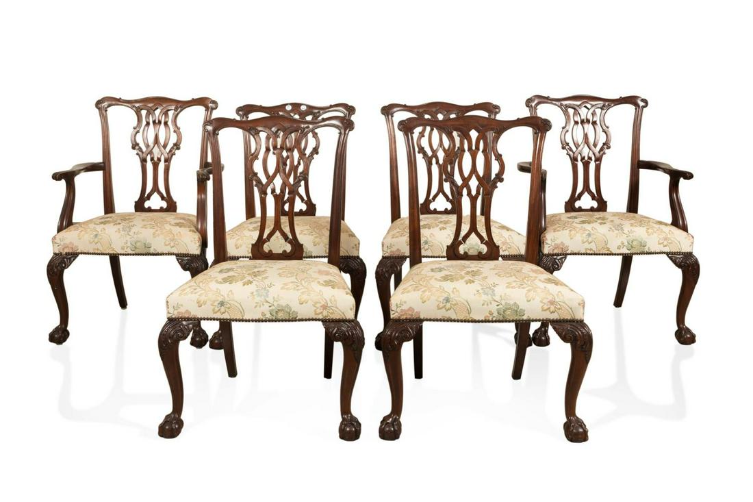 SIX BAKER CHIPPENDALE STYLE MAHOGANY DINING CHAIRS: Set of six Baker Furniture mahogany dining chairs in the George III Chippendale taste, comprising two arm and four side chairs, each having a pierced splat, and rising on front cabriole legs with acan