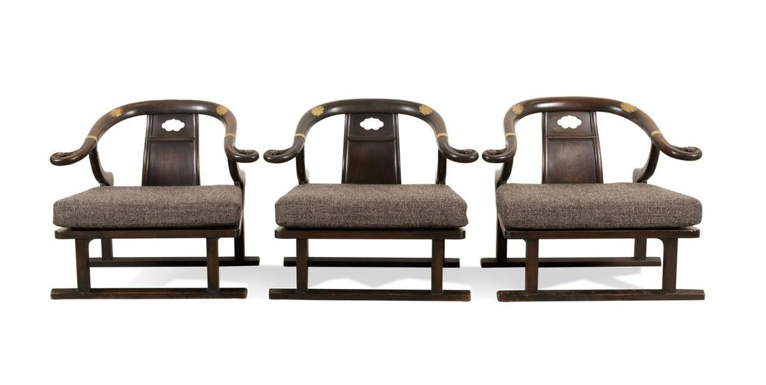 THREE BAKER MICHAEL TAYLOR "FAR EAST" ARMCHAIRS: Michael Taylor for Baker (American) "Far East" low arm chairs, having a horseshoe style crest rail and arms, pierced black splat, with an upholstered cushion, and rising on square legs with a stretche