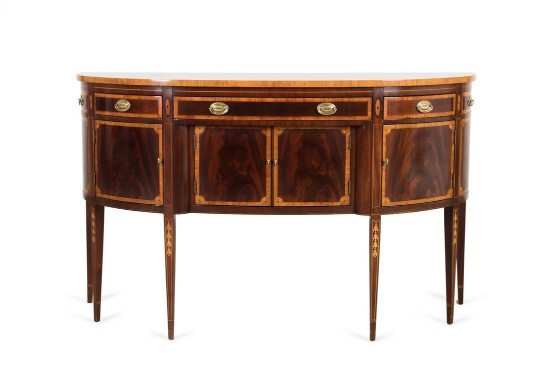 HICKORY WHITE HEPPLEWHITE STYLE MAHOGANY SIDEBOARD: Hickory White American Masterpiece Collection mahogany sideboard in the Federal Hepplewhite taste, having a banded top and drawer fronts, with a center long drawer flanked by two shorter drawers, with
