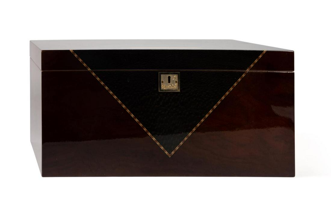 CIGAR STAR CONTEMPORARY PARQUETRY INLAID HUMIDOR: Cigar Star (Canadian 2001), large Limited Edition Series contemporary mixed wood parquetry humidor, having an inlaid cigar to the lid, analog hygrometer, cedar lining with tray, and cigar cutter, mark