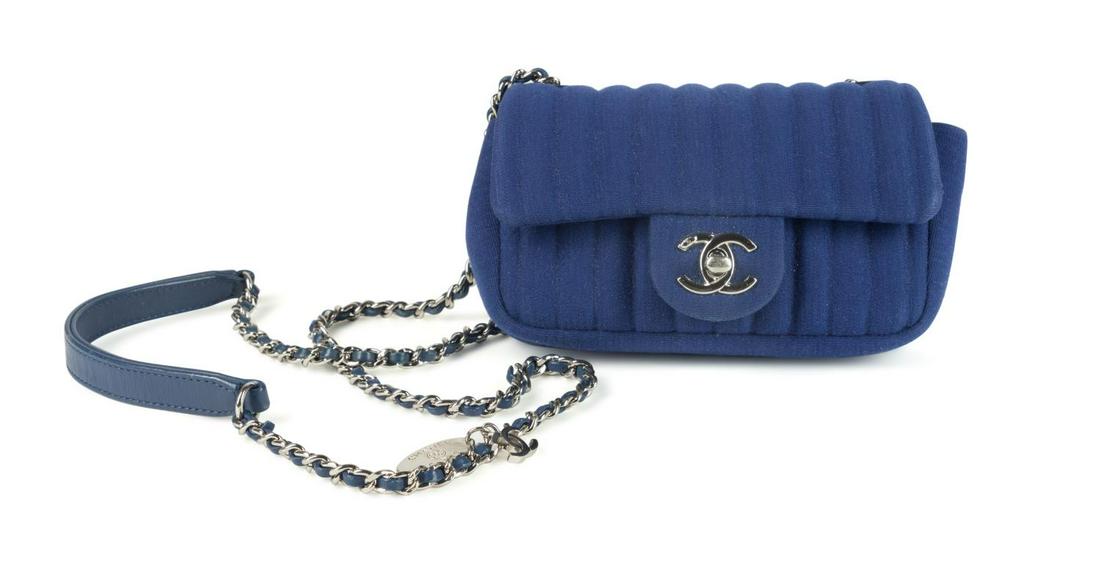 CHANEL FRANCE MINI QUILTED JERSEY CROSS-BODY: Chanel France cobalt quilted Jersey mini single flap cross-body, 2015-2016, having channel quilting on cobalt blue jersey, with silver hardware including a CC turnlock and an interwoven cross body str
