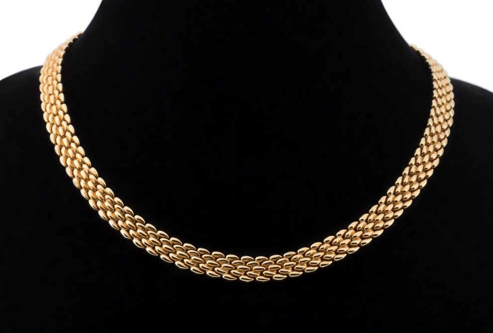 CHIMENTO 18K BI-COLOR REVERSIBLE NECKLACE: Chimento Italian 18k yellow and white gold reversible panther link necklace, one side executed in yellow gold and the other in a white and yellow gold pattern, marked Chimento, 750, and a star for Ita