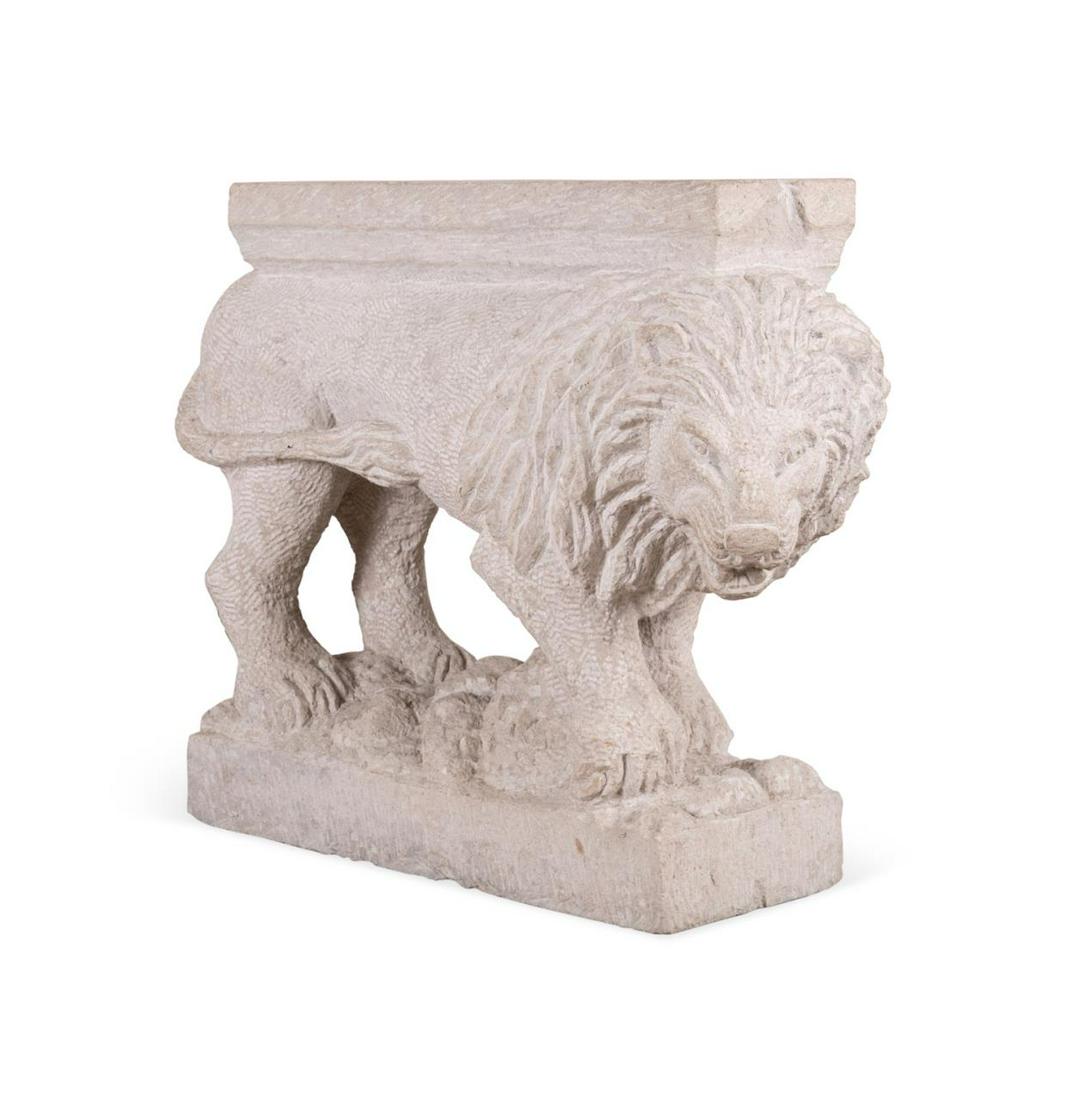 MEDIEVAL STYLE CARVED STONE LION TABLE BASE: Carved stone console table base in the Medieval taste, modeled as a crouching lion with right right paw extended, on a plinth base, apparently unmarked. Approximate dimensions: h. 29. 5", w. 39", d. 1