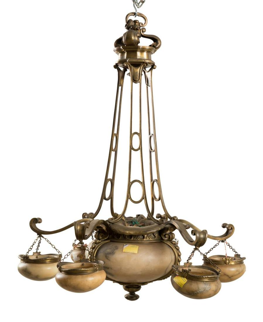 CAFE DE LA PAIX ART NOUVEAU CHANDELIER, C. 1900: French Art Nouveau gilt bronze chandelier, circa 1900, having a scrolled corona with suspended lower curving corona containing an alabaster bowl with three lights, and issuing six arms each with a han