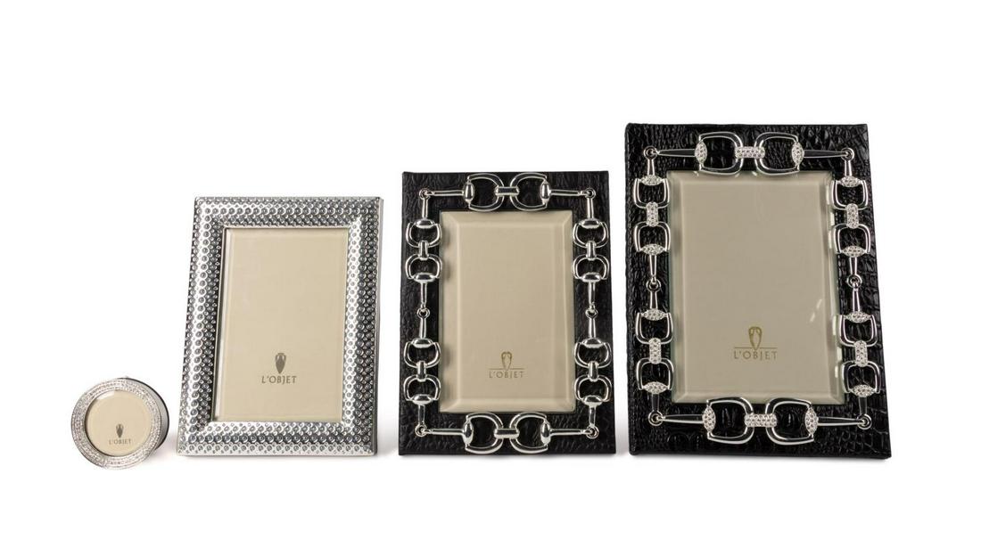 FOUR L'OBJET EMBELLISHED PICTURE FRAMES: Four L'Objet embellished picture frames comprising, a small round frame with crystals, a rectangular frame with gray pearls and crystal, and two frames with an alligator pattern and chain link accents