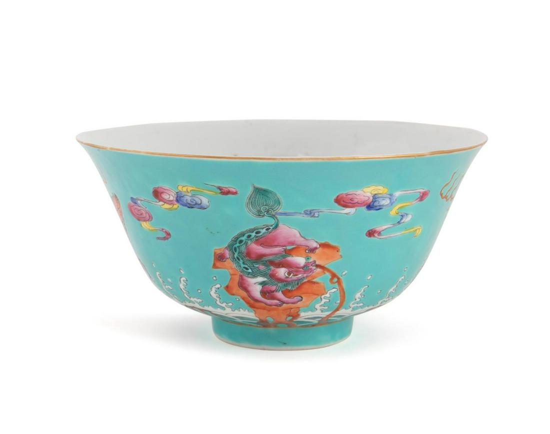 CHINESE TURQUOISE GROUND FAMILLE ROSE QILIN BOWL: Chinese Famille Rose Qilin bowl, of typical form with a slightly flared rim resting on a ring foot, the interior decorated with peony, lotus, prunus, and chrysanthemum flowers denoting the four season