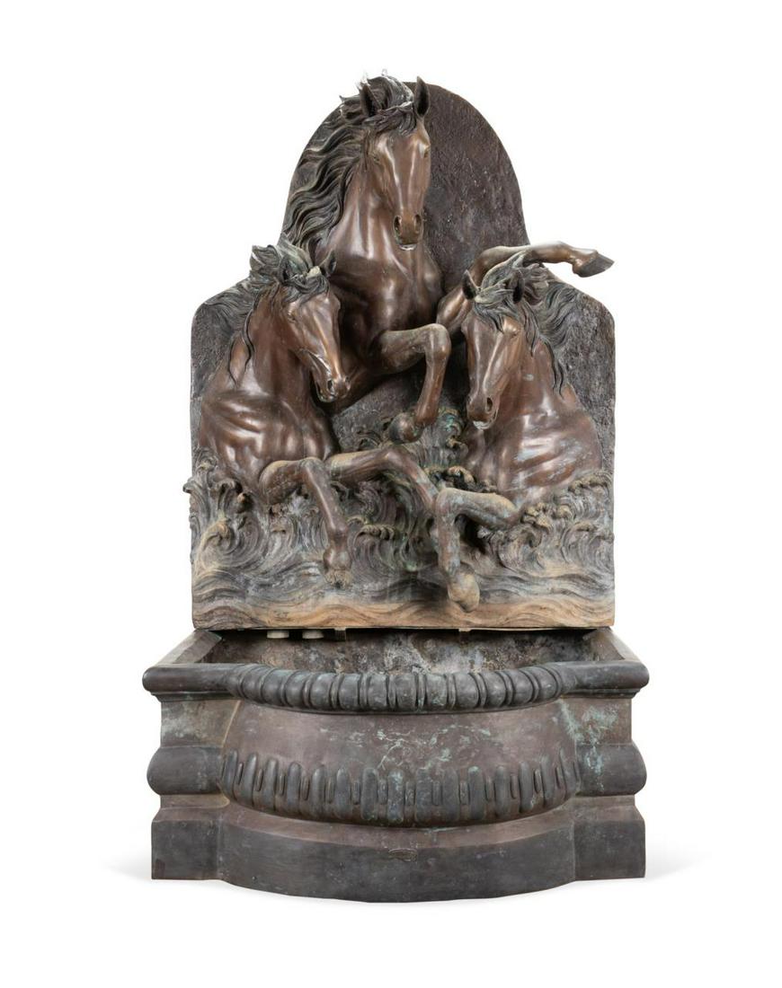 BRONZE WALL FOUNTAIN AFTER 'HORSES OF ANAHITA': Italian style large verdigris bronze wall fountain after "The Horses of Anahita", late 20th / early 21st century, having three running horses over a square basin with a half moon front side, Hughes ma